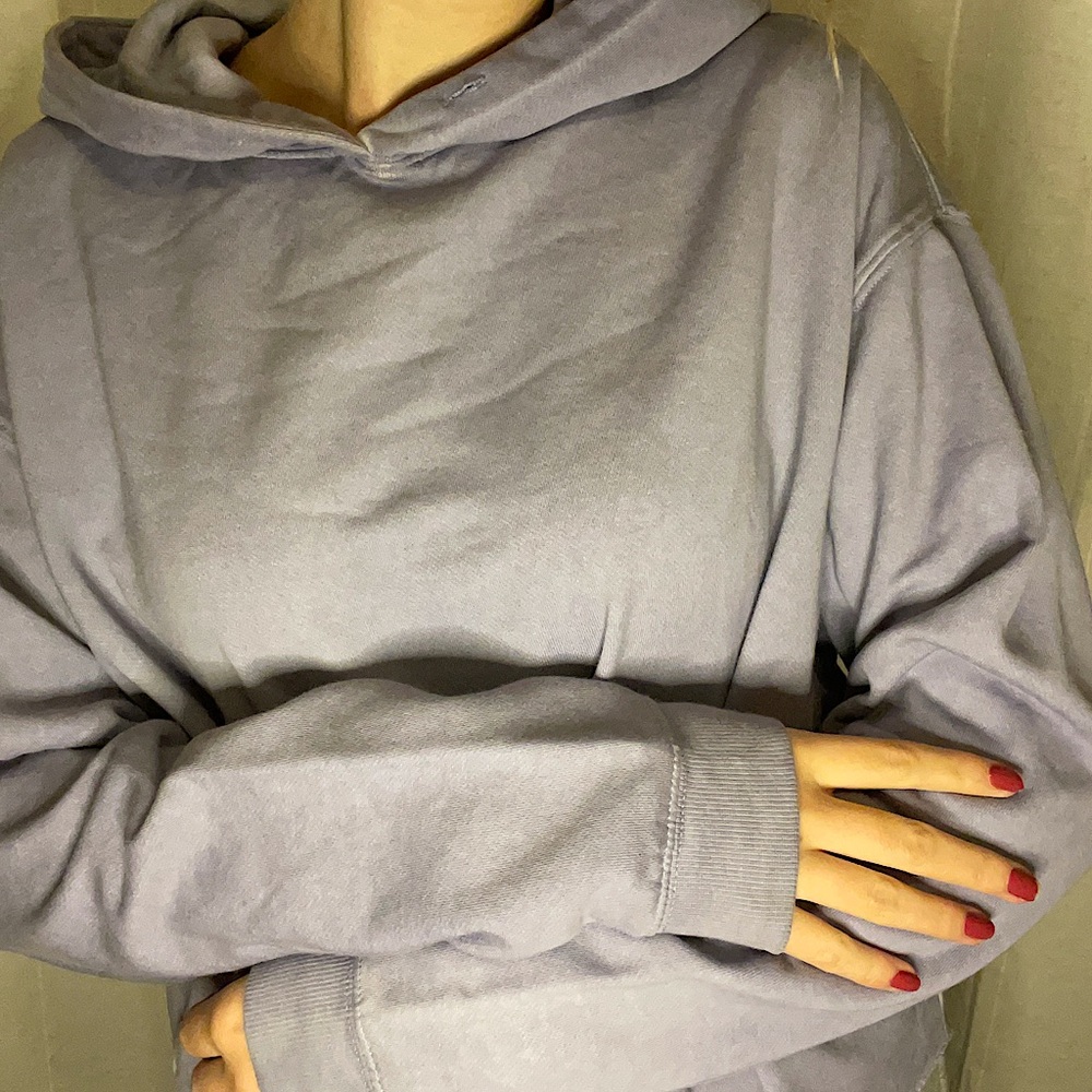 Light blue hoodie. Fits sizes small-medium. Soft interior.